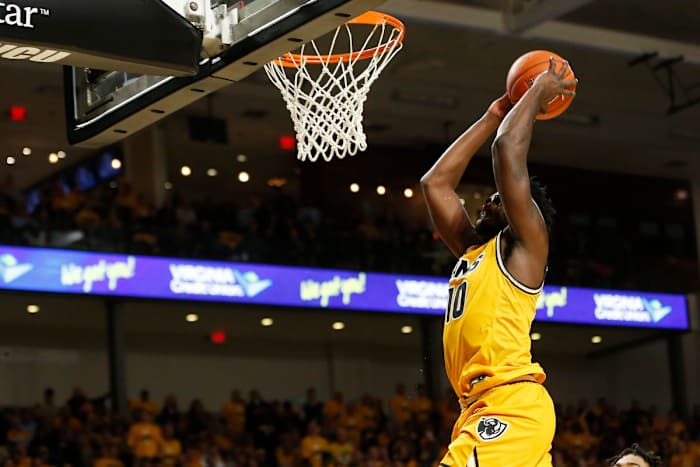 Virginia Commonwealth Rams guard Vince Williams (10) dunks the ball against the LSU Tigers in the first half at Stuart C. Siegel Center.